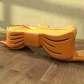 Orange Modern Public Chair With Curved Shape And Smooth Surface On Wooden Floor