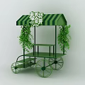 Green Flower Cake Cart with Striped Canopy Hanging Vines and Decorative Wheels