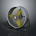 Electric Fan With Yellow Blades And Metal Mesh Cover On Base Stand