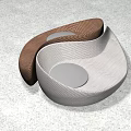 Modern Abstract Sofa With Unique Curved Design Brown And Light Gray Fabric Round Cushions