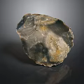 Natural Stone Sculpture Carving With Textured Surface And Artistic Design