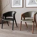 Gray and Black Leather Leisure Chairs with Wooden Legs in Modern Interior with Wall Art