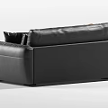 Modern Black Leather Two Seater Sofa With Brown And Black Pillows