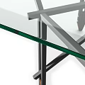 Sleek Glass Top Table With Black Metal Frame And Rolling Wheels Design