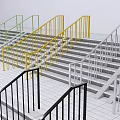 Staircases With Colorful Metal Handrails And Concrete Steps In Various Hues