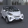 White Compact Electric Car With Modern Design And LED Headlights In Outdoor Building Setting