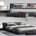 Modern Double Bed With Nightstand Lamp Pillows Blanket Duffel Bag And Small Plant