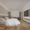 Modern Hotel Room With Large Bed White Bedding Wooden Flooring Flat Screen TV And Sofa