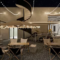 Industrial Style Café Interior Featuring Gray Walls Green Plants Round Pendant Lights And Black Furniture