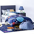 Kids Bed With Dark Blue Quilt Planet Stars Adventure Pillows Nightstand Lamp Bean Bag Chair