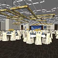 Elegant Banquet Hall Setup With White Tablecloths Golden Chandeliers And Flower Decorations