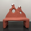 Unique Public Bench With Orange Surface White Accents And Circular Holes Design