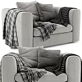 Modern Cozy Gray Velvet Accent Chair with Soft Pillows and Plaid Blanket in Living Room