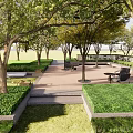 Serene Courtyard Garden Design With Lush Trees Paved Area Seating And Trimmed Hedges