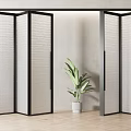 Modern Indoor Folding Door With Black Frame And Woven Texture Near Green Plant