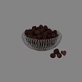 Fresh Ripe Strawberries in Silver Wire Mesh Bowl with Green Leaves and Sliced Pieces Scattered