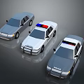Three Police Cars With Emergency Lights Including White And Gray Vehicles