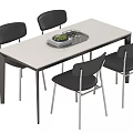 Modern Rectangular White Dining Table Set with Four Black Chairs Tray and Green Plant 3d model