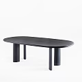 Modern Black Oval Office Desk With Cylindrical Legs Simple Design For Workspace