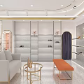 Fashion Boutique Interior With Marble Walls Gold Shelves Orange Seating And Clothing