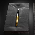 Luxury Pen With Black And Gold Design On Black Velvet Surface Elegant Premium Writing Instrument