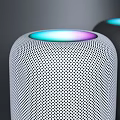 Two White And Black Cylindrical Smart Speakers With Colorful Light Rings On Top Modern Design
