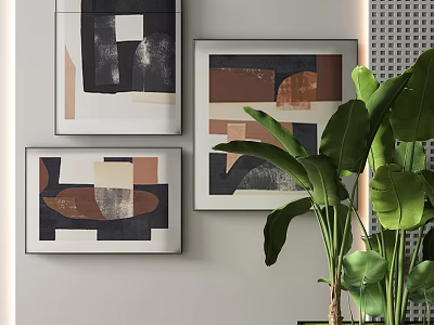 Modern Interior Wall Decor with Framed Abstract Paintings and Green Plant 3d model