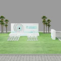 Outdoor Event Space Layout With Green Lawn Arranged Seats Palm Trees And Large Screen