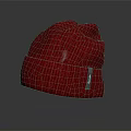 Red Soft Ribbed Knit Beanie With Tag On Gray Background
