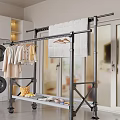 Floor Standing Clothes Rack with Hanging Clothes Quilt and Washing Machine in Indoor Laundry Area