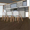Modern Architecture Design Featuring Sloped Roofs Stone Walls Large Glass Windows Terrace With Tables Chairs
