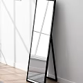 Modern Full Length Mirror With Black Frame Against White Wall