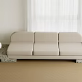 Modern Beige Three-Seater Sofa with Stone Base Design Near White Window Curtains