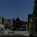 European Style Commercial Street With Clock Tower Cobblestone Square And Wooden Benches