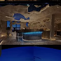 Unique Restaurant Interior Design With Cave Like Ceiling Blue Art Bar Counter And Black Stools