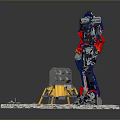 Transformers Optimus Prime Figure With Lunar Module Model And Small Figure On Gravel Base