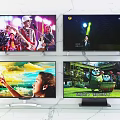 Televisions Showing Concert Stage Nature And Animation Scenes On Marble Shelf