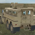 Tan Military Tank With Six Wheeled Design Rocket Launcher On Roadside Grassland