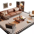 Brown Leather Sofa With Throw Pillows Blanket And Coffee Table Set On Area Rug