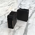 Two Sleek Black Computer Cases With Modern Design On Marble Surface