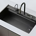 Modern Black Kitchen Sink With Faucet Control Knobs And White Countertop