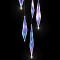 Five Diamond Shaped Purple And Blue Gradient Pendant Lights Glowing On Black Background