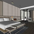 Modern Hotel Guest Room Featuring Large Bed Sofa Floor to Ceiling Windows And Wooden Floors