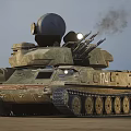 Military Tank With Radar System Firing Cannons Ejecting Flames On Desert Terrain