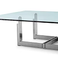 Modern Glass Top Table With Sleek Metal Frame And Contemporary Design