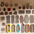 Various Shapes And Colors Mirrors Hanging On Wall For Decorative