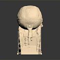 Golden Artistic Sculpture with Intricate Carved Sphere on Detailed Steps