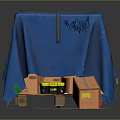 Household Items Covered With Blue Cloth On Pallet And Cardboard Box