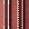 Door Handles of Various Materials and Different Colors Arranged on Red Background