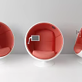 Modern Spherical Seats With Red Cushions White Bases And Tablet Screens